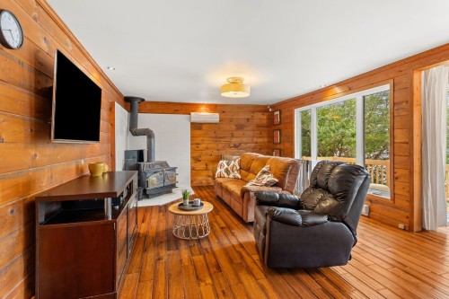 Salon - 4320 Rue Laval, Chertsey, QC - Indoor Photo Showing Living Room With Fireplace