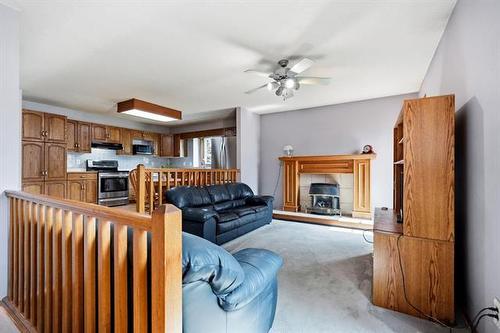 16 Glenthorne Cr, Winnipeg, MB - Indoor Photo Showing Other Room With Fireplace
