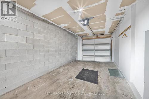77 - 800 Paramount Drive, Hamilton, ON - Indoor Photo Showing Garage