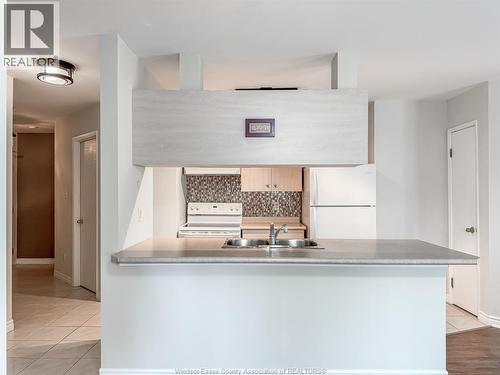 1655 Grand Marais Unit# 310, Windsor, ON - Indoor Photo Showing Kitchen With Double Sink
