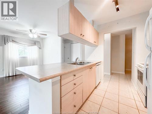 1655 Grand Marais Unit# 310, Windsor, ON - Indoor Photo Showing Kitchen With Double Sink