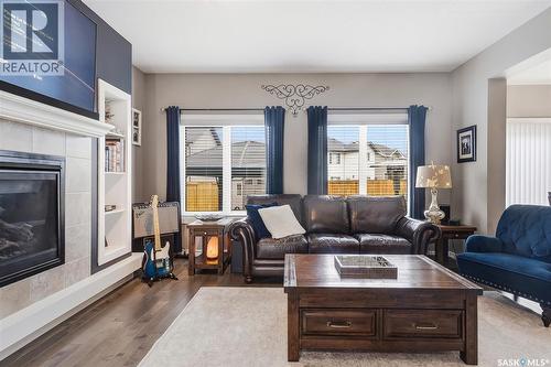 419 Kensington Boulevard, Saskatoon, SK - Indoor Photo Showing Living Room With Fireplace