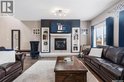 419 Kensington Boulevard, Saskatoon, SK - Indoor Photo Showing Living Room With Fireplace