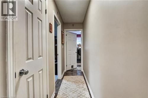 Hallway to 2nd bedroom and laundry room - 11 Rochelle Crescent, Ridgeway, ON - Indoor Photo Showing Other Room