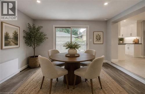 Wood-finish flooring with recessed lighting, and a sliding glass door - 244 Royal Street, Waterloo, ON - Indoor Photo Showing Dining Room