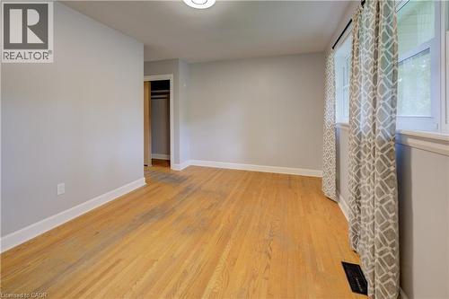 Light-toned wood flooring, neutral wall tones, and white trim - 244 Royal Street, Waterloo, ON - Indoor Photo Showing Other Room