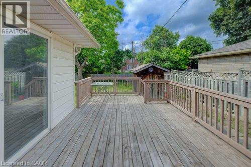 Spacious outdoor deck with wood railing, leading to a storage shed - 244 Royal Street, Waterloo, ON - Outdoor With Deck Patio Veranda With Exterior