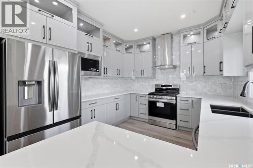 1215 Nightingale Terrace, Saskatoon, SK - Indoor Photo Showing Kitchen With Double Sink With Upgraded Kitchen