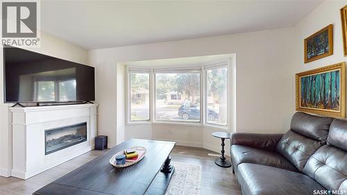 30 Probe Street, Regina, SK - Indoor Photo Showing Living Room With Fireplace