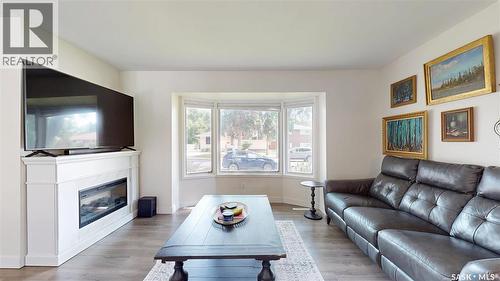 30 Probe Street, Regina, SK - Indoor Photo Showing Living Room With Fireplace