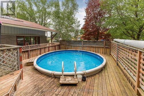 3500 Baldwick Lane, Springwater, ON - Outdoor With Above Ground Pool With Deck Patio Veranda