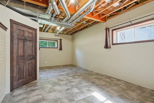 Salle familiale - 4066 Ch. Montpetit, Austin, QC - Indoor Photo Showing Basement
