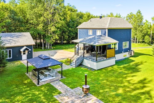 Face arrière - 4066 Ch. Montpetit, Austin, QC - Outdoor With Deck Patio Veranda