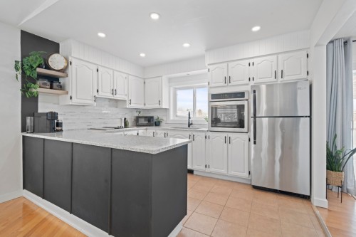 Kitchen - 5 Rue Île-Mathieu, Laval (Saint-François), QC - Indoor Photo Showing Kitchen With Upgraded Kitchen