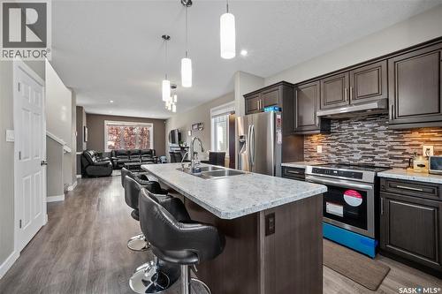 8726 Archer Lane, Regina, SK - Indoor Photo Showing Kitchen With Stainless Steel Kitchen With Double Sink With Upgraded Kitchen