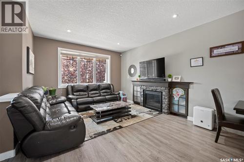 8726 Archer Lane, Regina, SK - Indoor Photo Showing Living Room With Fireplace