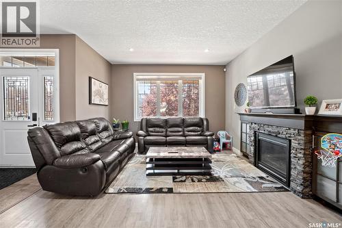 8726 Archer Lane, Regina, SK - Indoor Photo Showing Living Room With Fireplace
