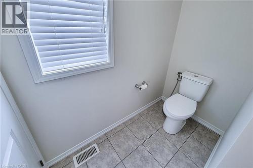 Window with blinds, white toilet, tiled flooring, white trim - 11 Esther Crescent, Thorold, ON - Indoor Photo Showing Bathroom