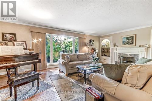 19 Oakley Road, Brantford, ON - Indoor Photo Showing Living Room With Fireplace