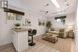 Virtually Staged Basement Rec Room - 