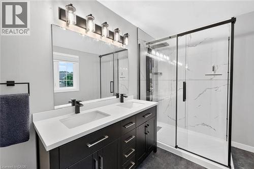 Dual vanity with white undermount sinks and matte black fixtures - 43 Liam Drive, Ancaster, ON - Indoor Photo Showing Bathroom