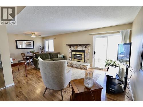 111 Tabor Boulevard, Prince George, BC - Indoor Photo Showing Living Room With Fireplace