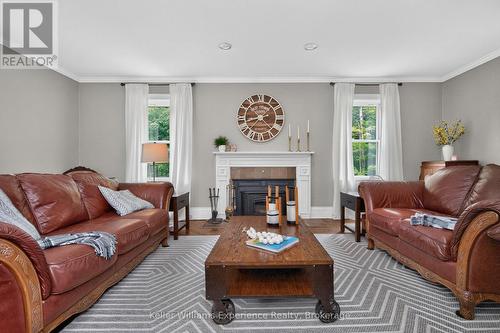3744 Flos 4 Road W, Springwater, ON - Indoor Photo Showing Living Room With Fireplace