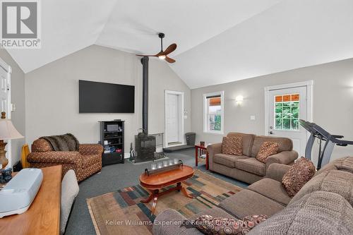 3744 Flos 4 Road W, Springwater, ON - Indoor Photo Showing Living Room With Fireplace
