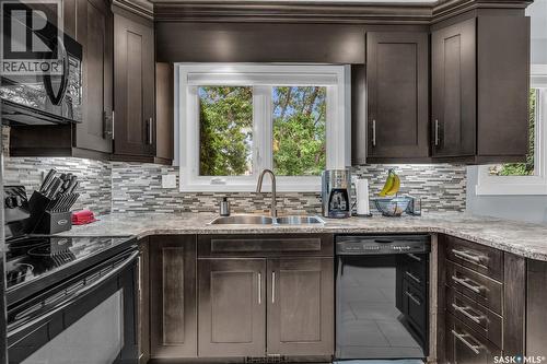 26 Fyfe Street, Regina, SK - Indoor Photo Showing Kitchen With Double Sink
