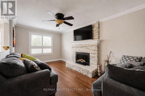 8 Ballycastle Crescent, Brampton, ON - Indoor Photo Showing Living Room With Fireplace