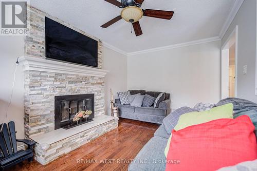 8 Ballycastle Crescent, Brampton, ON - Indoor Photo Showing Living Room With Fireplace
