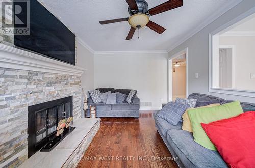 8 Ballycastle Crescent, Brampton, ON - Indoor Photo Showing Living Room With Fireplace