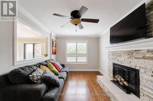 8 Ballycastle Crescent, Brampton, ON - Indoor Photo Showing Living Room With Fireplace