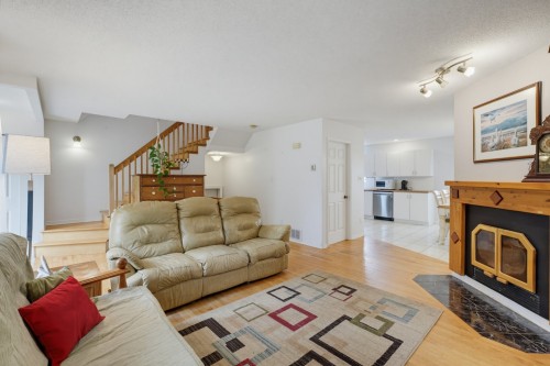 Salon - 401 Ch. Lamarche, L'Ange-Gardien, QC - Indoor Photo Showing Living Room With Fireplace