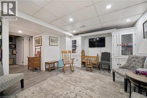 Recessed lighting, wood-finish flooring, white built-in cabinetry, and white paneled ceiling - 439 Beaver Creek Road, Waterloo, ON - Indoor