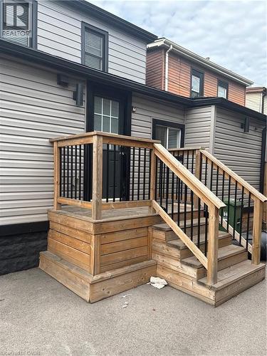 Rear view of property with a deck and stairs - 1090 Cannon Street E Unit# 2, Hamilton, ON - Outdoor With Exterior
