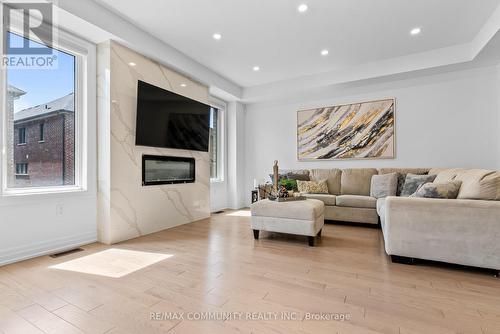 2879 Foxden Square, Pickering, ON - Indoor Photo Showing Living Room With Fireplace