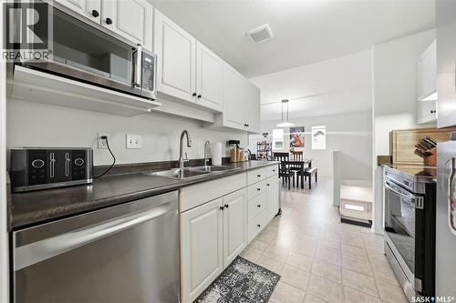 204D 141 105Th Street W, Saskatoon, SK - Indoor Photo Showing Kitchen With Double Sink