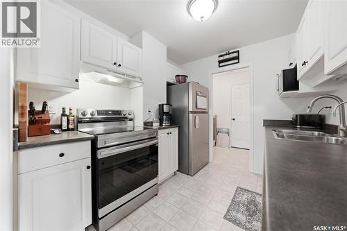 204D 141 105Th Street W, Saskatoon, SK - Indoor Photo Showing Kitchen With Double Sink