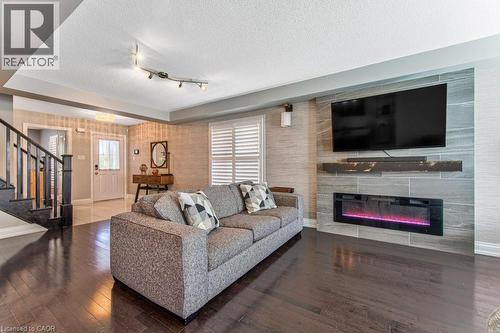 76 Ruhl Drive S, Milton, ON - Indoor Photo Showing Living Room With Fireplace