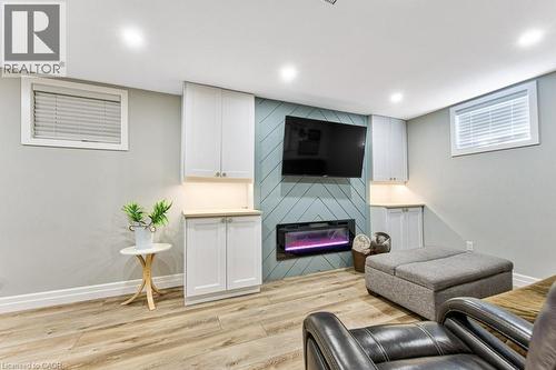 76 Ruhl Drive S, Milton, ON - Indoor Photo Showing Basement With Fireplace