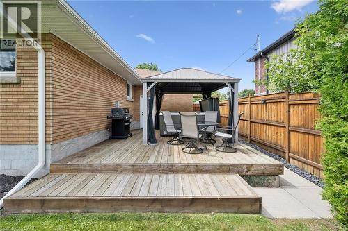 Wood-finish deck with two steps, featuring a gazebo and a wood fence - 49 East Street, Cambridge, ON - Outdoor With Deck Patio Veranda With Exterior