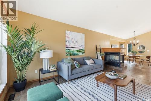 703 Beechmont Lane, Saskatoon, SK - Indoor Photo Showing Living Room With Fireplace
