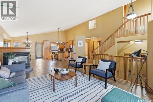 703 Beechmont Lane, Saskatoon, SK - Indoor Photo Showing Living Room With Fireplace