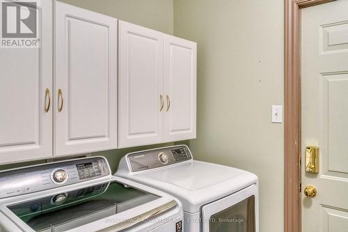 Main Floor Laundry Area + Garage Entry ... - 58 Decaria Boulevard, Perth, ON - Indoor Photo Showing Laundry Room