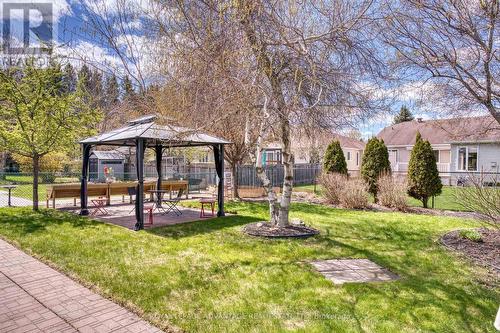 Entry View to Fenced Backyard ... - 58 Decaria Boulevard, Perth, ON - Outdoor With Deck Patio Veranda