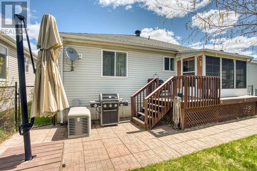 View to Sunroom Entry + Stand-By Generator to Left - 58 Decaria Boulevard, Perth, ON - Outdoor With Deck Patio Veranda With Exterior