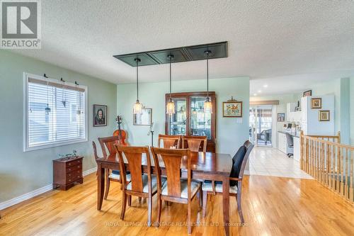 Gorgeous Light Fixtures ... - 58 Decaria Boulevard, Perth, ON - Indoor Photo Showing Dining Room