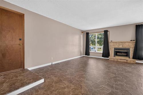 92 Blackwater Bay, Winnipeg, MB - Indoor Photo Showing Other Room With Fireplace
