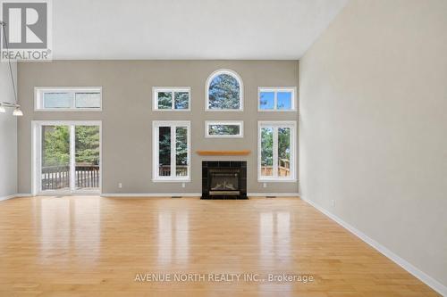 141 Gladeview Private, Ottawa, ON - Indoor Photo Showing Living Room With Fireplace